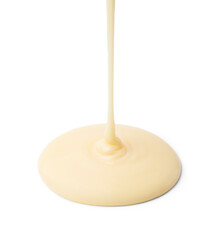 Pouring tasty condensed milk isolated on white
