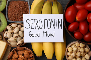 Many different products and card with phrase Serotonin Good Mood on table, flat lay. Natural...