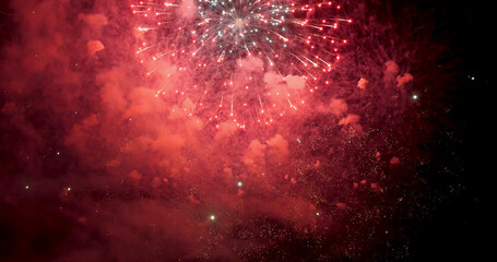 Red Firework celebrate anniversary in night time celebrate national holiday. Happy new year 2024,...