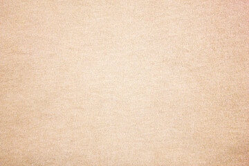 Fototapeta na wymiar Beige textile texture, background. Light brown fabric, linen.