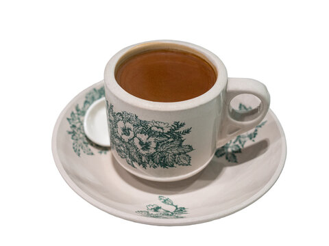 Asian style coffee in a vintage ceramic cup and saucer. Isolated, transparent background.