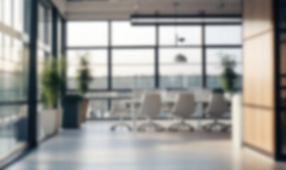 Fototapeta premium Beautiful blurred background of a light modern office interior with panoramic windows and beautiful lighting