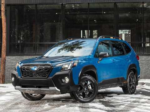 Novosibirsk, Russia -  November 10  , 2023:  blue Subaru Forester,   front view, parked of a city. No other car and people.