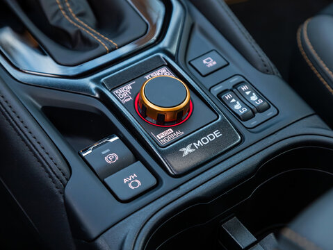 Novosibirsk, Russia -  November 10  , 2023:  Subaru Forester, Close-up on the seat heatting, tcs off, i-stop off and other control buttons,  automatic adjust level dashboard. modern car interior