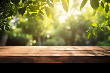 Naklejka na ściany i meble Empty wooden table for product display montages with green nature background.