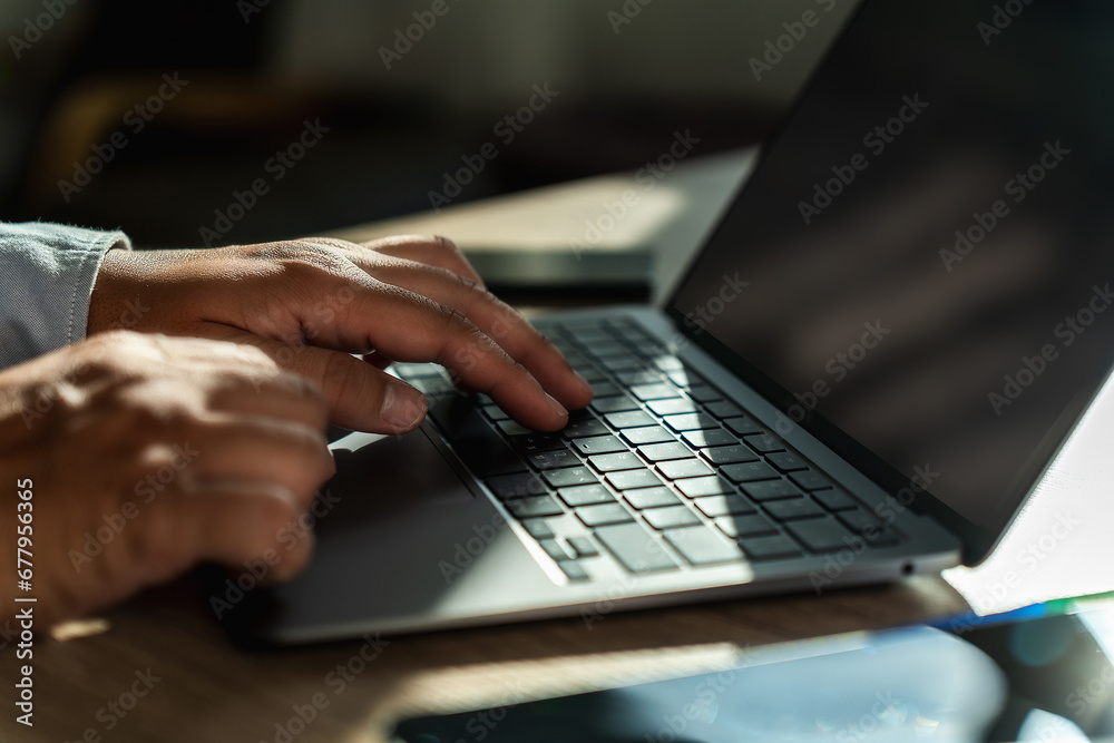 Poster man using a laptop typing, searching, web browsing, online on a computer search engine optimization 