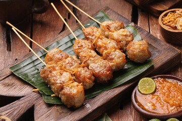 Sate taichan is a variation of chicken satay grilled and served without peanut or ketjap seasoning unlike other satays. It is served with sambal and squeezed key lime,