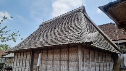 Fototapeta na wymiar Traditional Balinese house called Bale Manten. Bale Manten is a rectangular building and is divided into two parts (left and right). Used as a residence for parents and daughters. Using bamboo as wall
