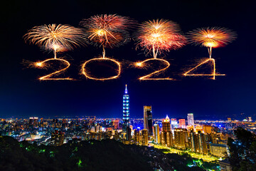 2024 happy new year fireworks celebrating over Taipei cityscape at night, Taiwan