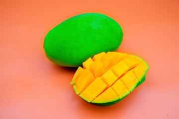 Fresh manggo fruit with orange background