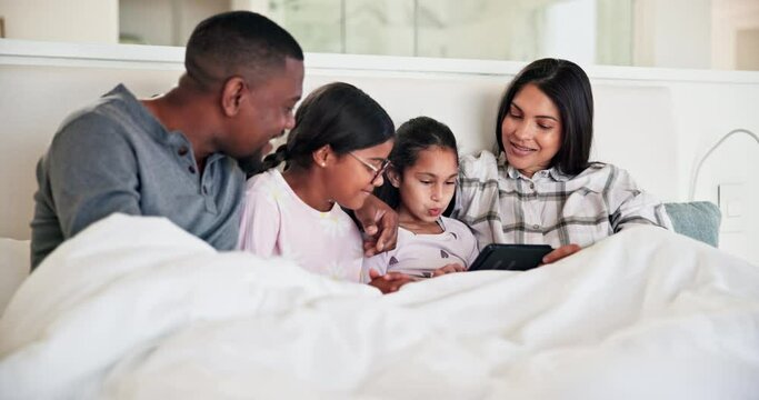 Parents, kids and happy family with tablet in bed for online games, download multimedia and reading ebook. Mom, dad and girl children watch digital movies, streaming cartoon and subscription in home