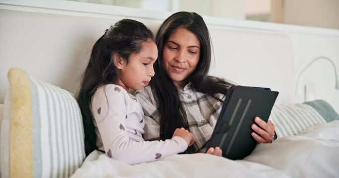 Mother, child and girl with tablet in bedroom for online games, download multimedia and reading ebook story. Happy mom, kid and digital technology for elearning, streaming cartoon and movies at home
