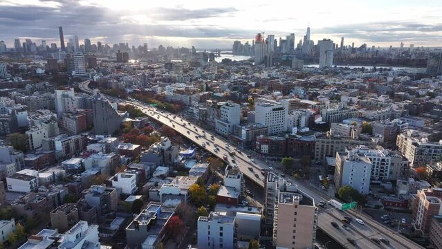 Brooklyn-Queens Expressway traffic passing through Williamsburg, Brooklyn on an autumn afternoon.