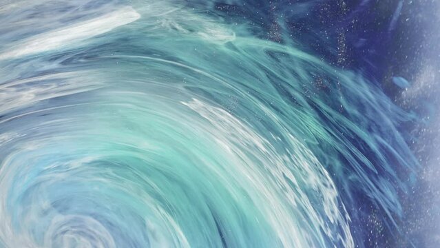 Vertical video. Ink swirl background. Ocean wave. Blue white cerulean glitter vapor vortex abstract sea whirlpool illusion magic water spiral captivating art.