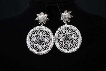 Hmong silver jewelry on black background, Handmade silver accessories © AlivePhoto