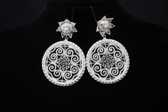 Hmong silver jewelry on black background, Handmade silver accessories