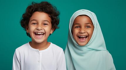 Portrait of joyful arabian kids on isolated solid green background - obrazy, fototapety, plakaty