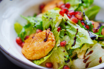 Salad with battered shrimps.