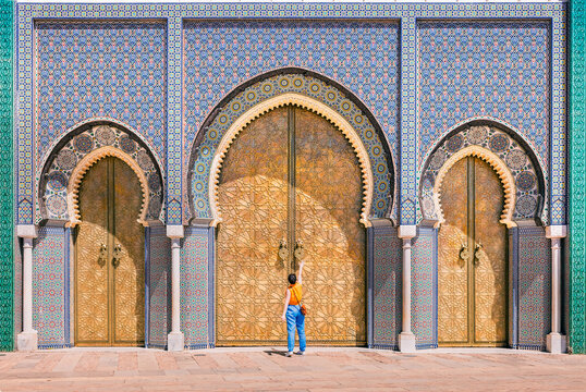 Fez, Morocco: golden Royal Palace doors	