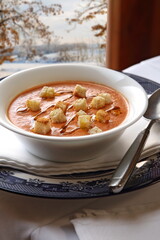Gazpacho, traditional cold soup from the Andalusia region with tomatoes, cucumber, peppers, garlic, vinegar, olive oil and ice water