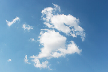 Blank sky surface with small clouds