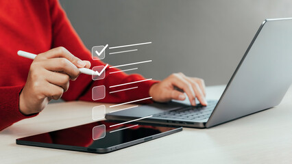 Business woman doing evaluation work Rate your digital document comments. Online surveys, digital form checklists Electronic document management