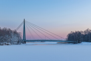 bridge over a frozen river in winter, Helsinki, Finland