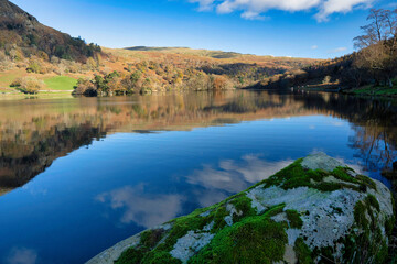 Magnificent scenery of Lake district national park with reflections on the water showing the...