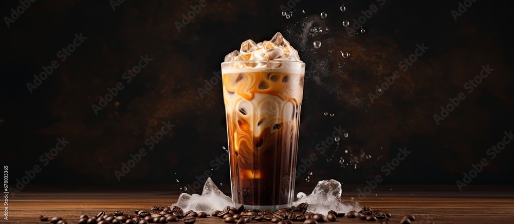 Canvas Prints Cream is poured over iced coffee in a tall glass Copy space image Place for adding text or design