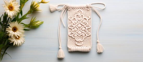 Eco friendly handmade cotton macrame phone bag for women with a modern summer concept Copy space image Place for adding text or design