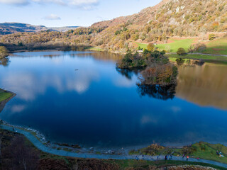 Fototapeta na wymiar Aerial image of Rydal water lake in the lake district national park, United kingdom on a beautiful autumn day. 