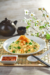 traditional chinese wok egg pineapple fried rice chicken floss xo sauce vegetable in plate on grey vintage background cafe hotel luxury halal food restaurant banquet menu