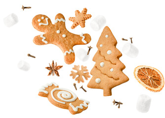 gingerbread cookies, marshmallows and spices levitate on a white isolated background