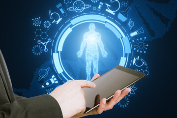Close up of male hand pointing at cellphone with round medical interface with human body outline...