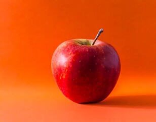 red apple on a red background
