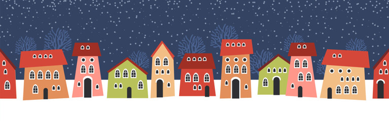 Cute Christmas and winter houses. Snowy night in cozy Christmas town city panorama. Winter village night landscape Christmas outdoor decorations.