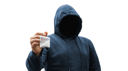 Faceless man in a hood holds transparent plastic bag with white powder hard drugs isolated on transparent background, anonymous drug dealer or gangster sells narcotics