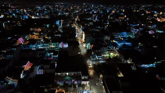 Aerial view of decoration lights on Diwali night in an Indian city. Drone view of Diwali night with twinkling electric lights. Diwali night aerial view. India from above. A Festival of Lights in India