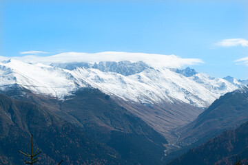 Foggy and snowy mountain landscape. Mountains covered with fog and clouds. Snow-capped hills. Snow-covered forest landscape. Black Sea mountains. Pokut Plateau. Kackar Mountains. Rize, Türkiye.