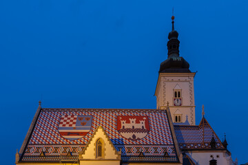 Fototapeta premium Zagreb, Croatia 10-9-2023 St. Mark is the parish church of old Zagreb, located in St. Mark's square and the oldest architectural monument in town, the roof tiles are the coat of arms of Croatia