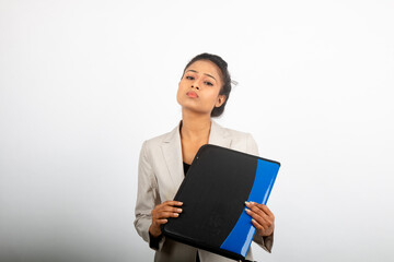 Corporate office lady holding a folder and giving presentation. Young woman in formal wear wearing white blazer giving different expressions with a folder in her hand