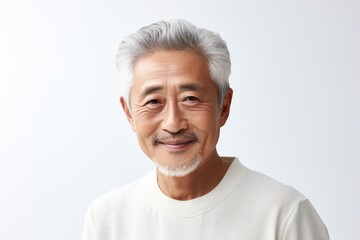 Obraz premium Portrait of a smiling elderly Asian man