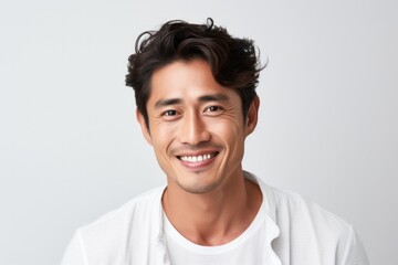 Portrait of a happy asian man