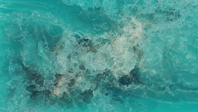 whirlpool in the sea. vortex in the sea. water of a turquoise sea swirls. choppy 3d turquoise sea. background of a water swirl in a tropical water