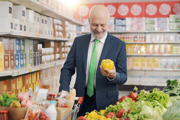 Customer buying fresh vegetables at the supermarket