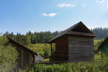 Fototapeta na wymiar Wooden hotel in Carpathian mountains. Location: Zakarpattya region, Ukraine