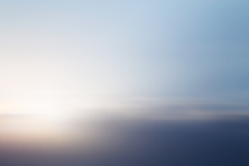 Fototapeta na wymiar Motion blurred clear blue beautiful sunlight background.
