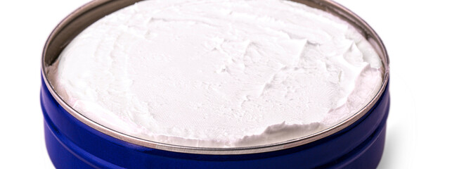 Blue opened cream tin isolated on white background