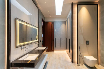 luxury bathroom interior with tiles, mirror, sink