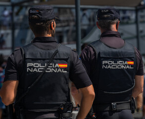 Policemen in the harbor of Cadiz, Spain
